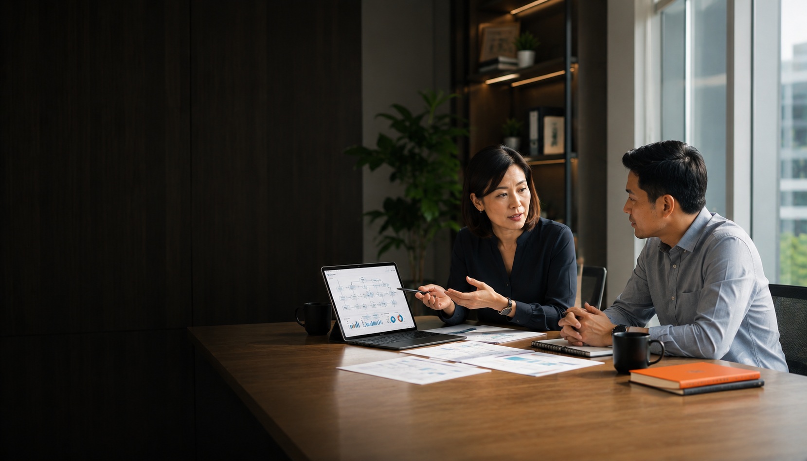 BPO Services Singapore — People Profilers consultant reviewing business process workflow and operations dashboard with client
